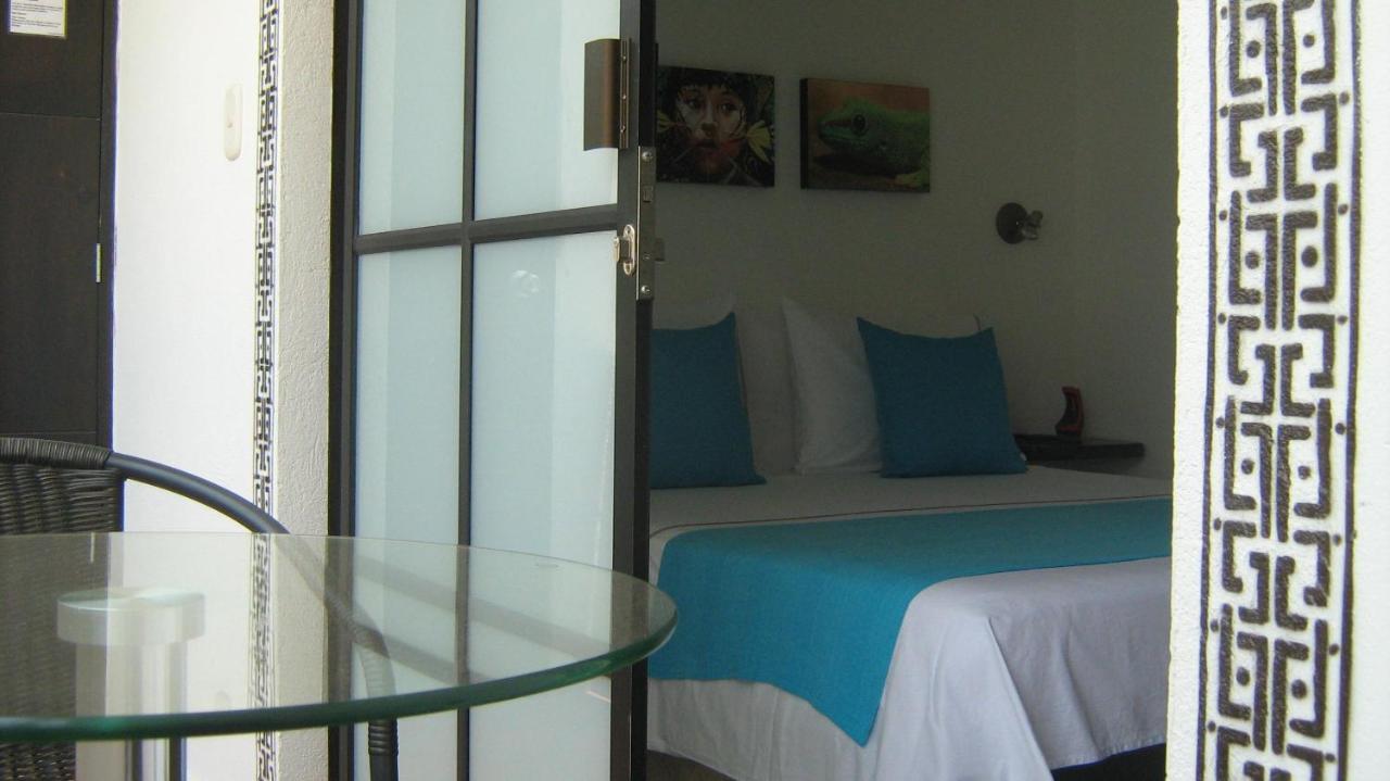 Hotel Ki'Kuxtah Таганга Экстерьер фото